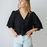 Intricately Defined Tie Top