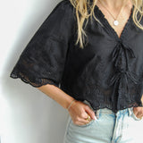 Intricately Defined Tie Top