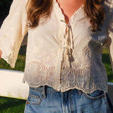 Intricately Defined Tie Top