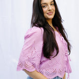Intricately Defined Tie Top