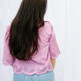 Intricately Defined Tie Top